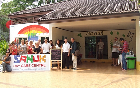 Benefactors and friends gather to celebrate the Sanuk Day Care Centre’s extreme make over.